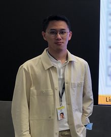 Student Limin Yang presents a poster of his externship work at an August 11 IBM event.